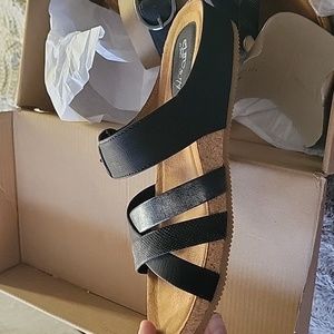 Brand new black sandals